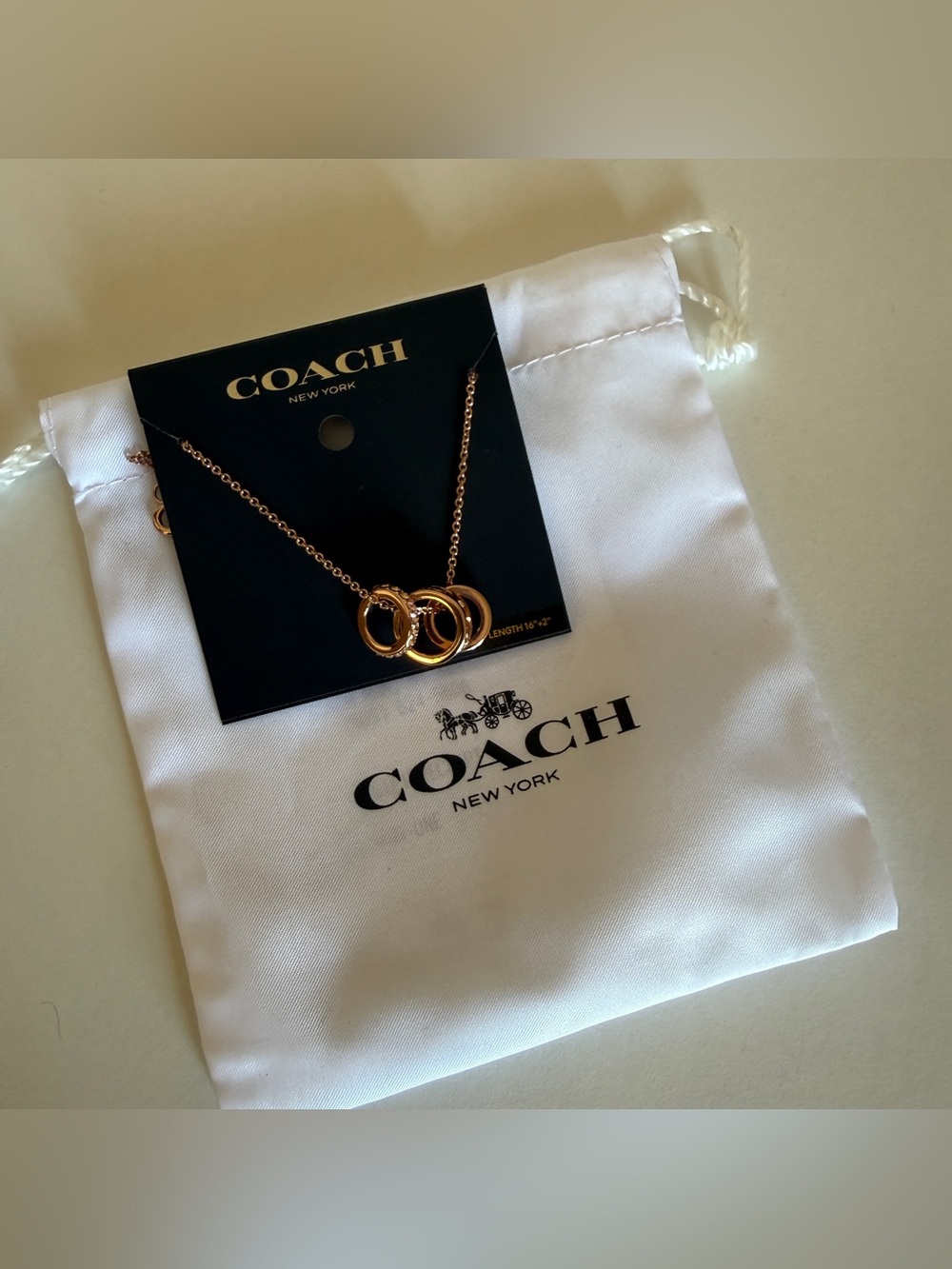 Coach Rose Gold Triple Interlocking Circle Necklace NO-TAG